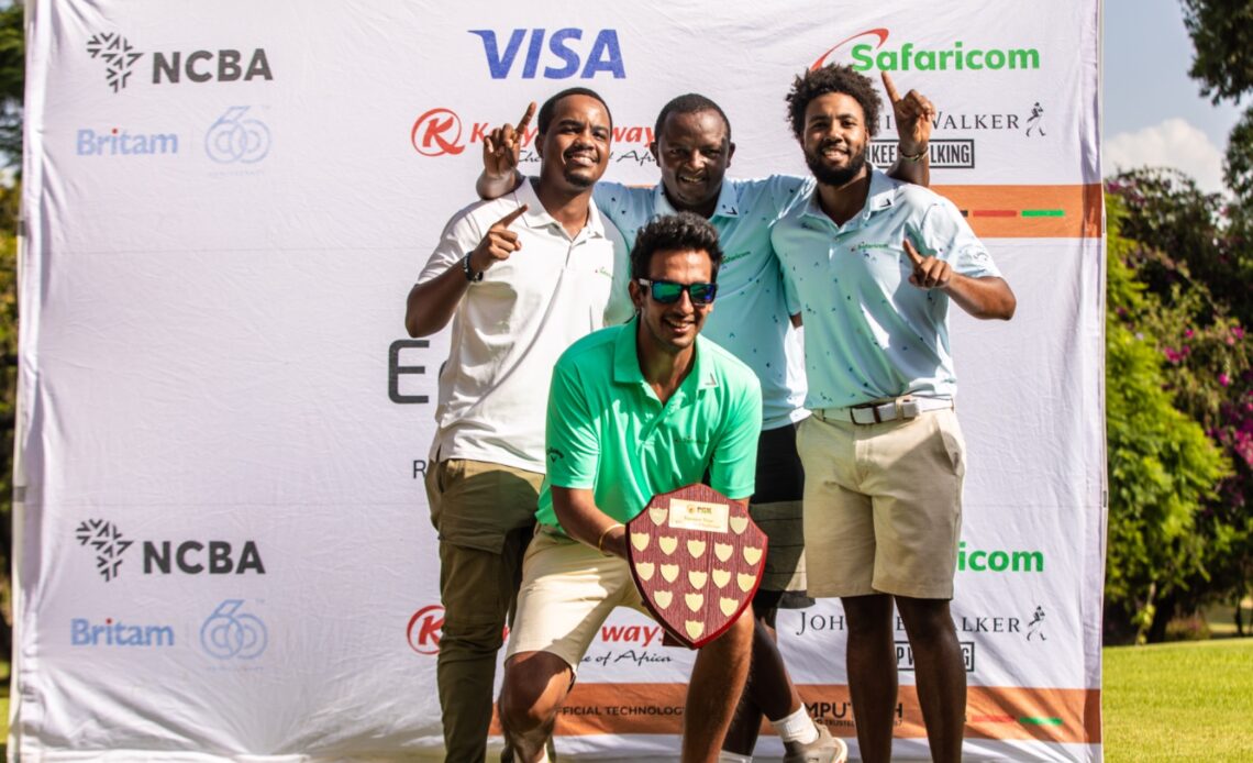 Matthew Wahome, Samuel Chege, Mohit Mediratta and Mutahi Kibugu, Safaricom’s four sponsored professional golfers, pose with their trophy